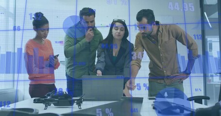 Financial data processing animation over diverse business team discussing in office - Powered by Adobe