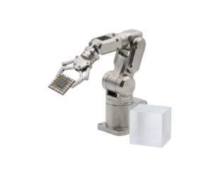 A metallic robotic arm holds a small circuit board while a cube rests nearby, showcasing precision and technology in automation.