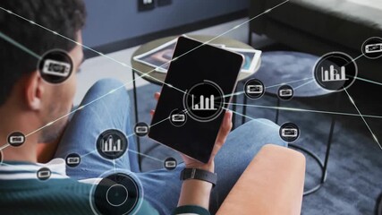 Man holding tablet, target graphic initiating nodes and lines spreading visualizing technology data