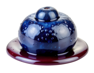 A glossy, round ceramic piece with a rich blue and maroon color scheme, featuring a domed top and decorative droplets on its surface.