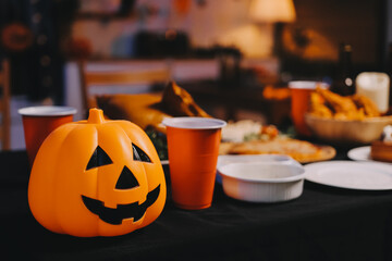 Friends enjoying a Halloween party at a bar making a toast