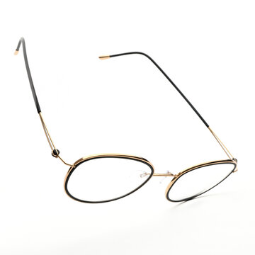 Flying glasses with transparent lenses on white and grey background for office and reading purposes