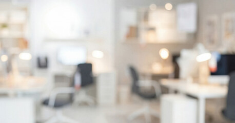 Modern office environment featuring multiple workstations with ergonomic chairs, bright lighting, and organized decor for a productive atmosphere.