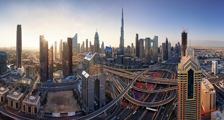 Beautiful aerial sunrise in Dubai centre with panoramic skyline view, UAE