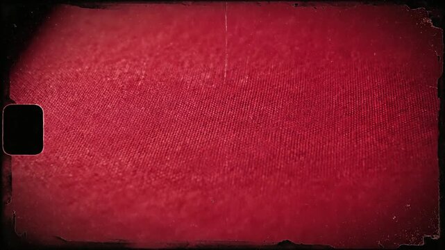Abstract red texture with light leak and film grain effect