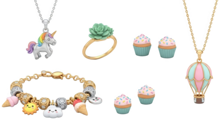 Whimsical gold and silver jewelry collection with unicorn and cupcake charms
