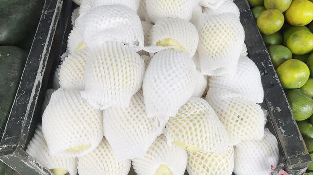 Freshly Wrapped Tropical Fruits for Sale
