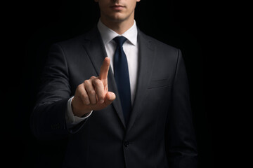 businessman open hand offering service support partnership isolated black background