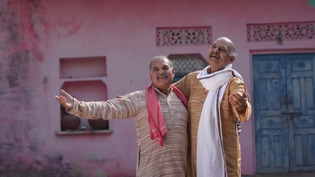 two senior indian farmer giving happy expression 