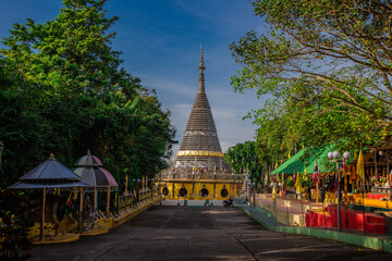 Fototapeta premium Background of religious sights on high mountains in Hat Yai District of Thailand (Phra Maha Ruesee Chedi Tripob Trimongkol) is a beautiful stainless steel pagoda, tourists always come to make merit du