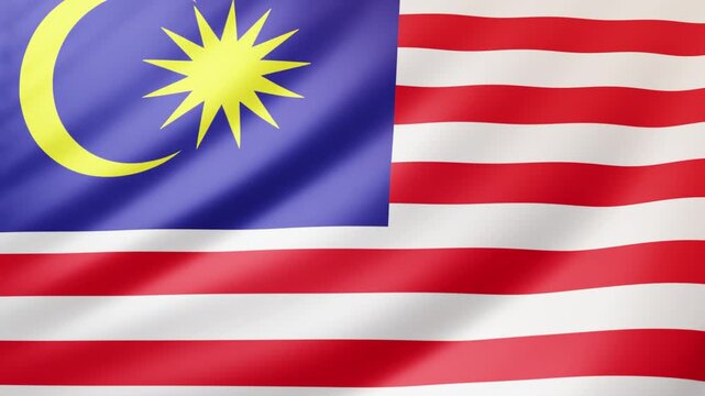 Waving Malaysian flag with yellow crescent and star on blue canton and red white stripes. Symbol of Malaysia, independence, patriotism, unity, and national identity.