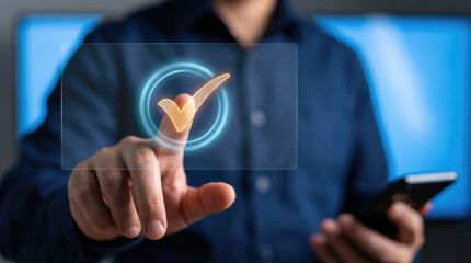 A person in a dark shirt holds a phone and touches a bright glowing circular interface with a hand icon inside it