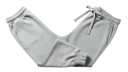 Light gray ribbed knit sweatpants folded in a V shape, drawstring visible