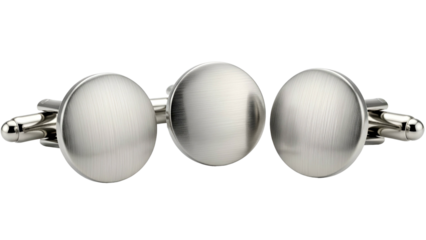 Three shiny, silver, circular cufflinks arranged in a row against a black background