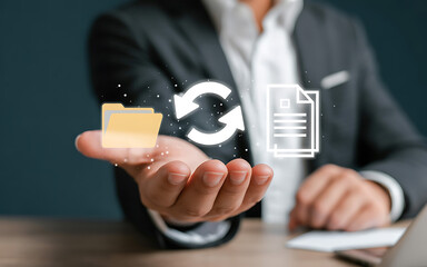 Businessman holding digital file and icons