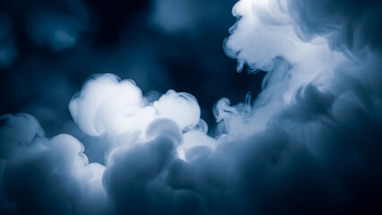 Dramatic Dark Blue Smoke or Ink Clouds on Black Background