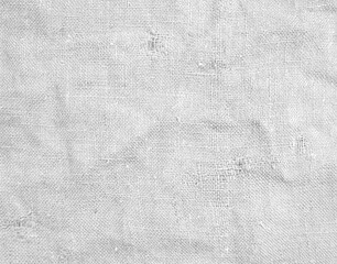 Weiße Jutesack Textur mit Knicken, Löchern und Falten als rustikaler Hintergrund