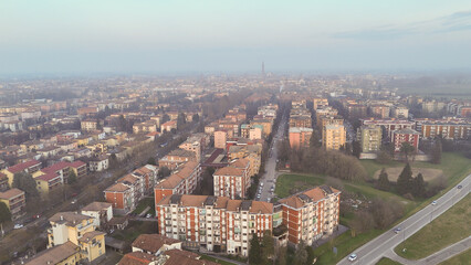 Fototapeta premium Aerial view of Cremona, Lombardy, Italy, showcasing urban sprawl and distant landmarks