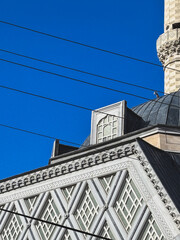 Mosque Dome and Minaret Detail with Blue Sky