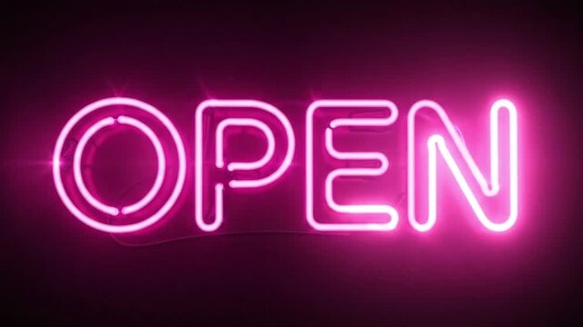 Bright neon open sign glowing in dark background representing business availability