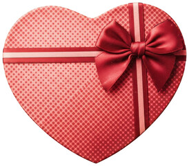 Heart shaped red gift box with polka dot pattern and satin bow ribbon