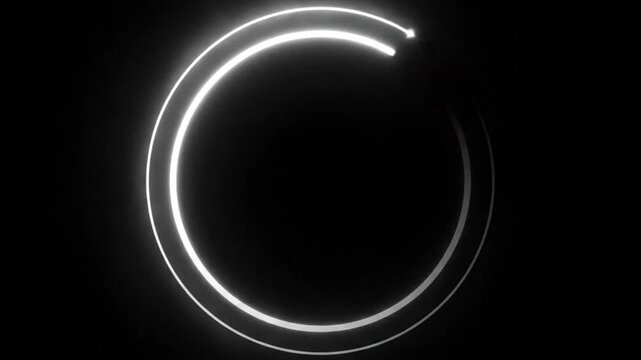 Abstract glowing circular light trail on dark background representing energy and motion