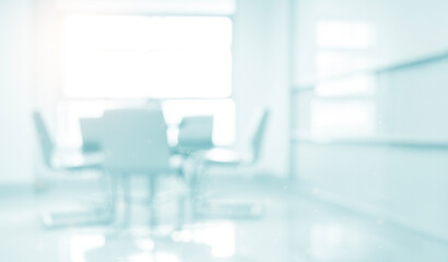 Abstract focus Hospital clinic room interior white space light blur blue background soft table health care People working inside luxury office meeting health care laboratory defocused grey wallpaper.