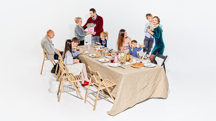 Elegant family celebrating International Women Day with flowers and festive dinner. Concept of women appreciation, family gratitude, lifestyle ads, gift branding, and emotional holiday storytelling