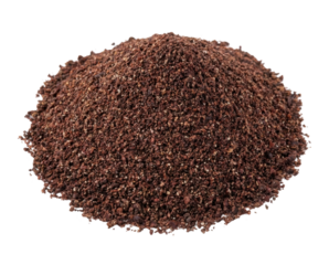 A pile of coarsely ground, dark reddish-brown sumac spice used as a culinary seasoning.