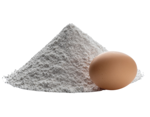 A brown egg rests against a conical pile of white flour, essential baking ingredients.