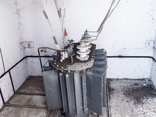 Large industrial iron metal transformer substation with transformers and high-voltage electrical...