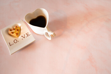 Valentines  mug  heart shaped  with  heart  shaped  cookie 