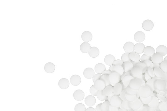 pile of white pills in corner isolated on white or transparent png