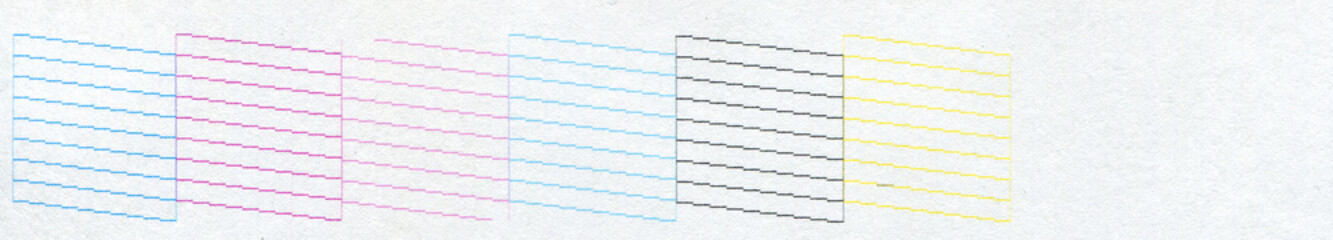 clogged nozzles of a six-color printer, specifically in light magenta and yellow