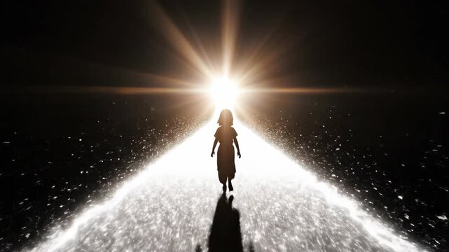 Silhouette of a girl walking towards bright light ethereal spiritual path