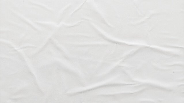 Blank white crumpled and creased paper background texture. Abstract paper poster background. White crumpled paper with natural creased surface details.