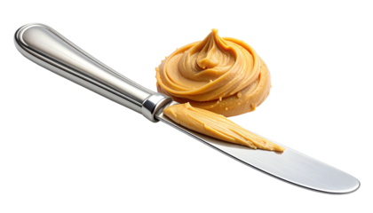 A stainless steel butter knife, smeared with peanut butter. A swirl of spread is on the plate