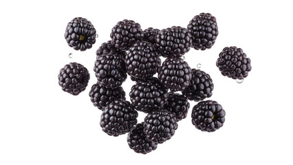 Fresh blackberries falling against black background with water drops