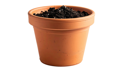 A terracotta pot filled with rich soil, ready for planting, against a black background