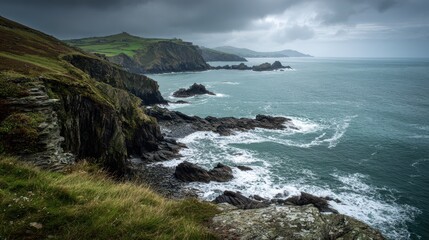 Fototapeta premium Isle of Man Coastal Landscape: Bradda Head and Calf of Man on the Horizon