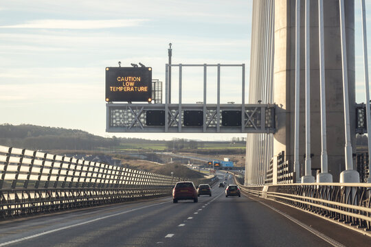 Motorway gantry caution low temperature sign in winter