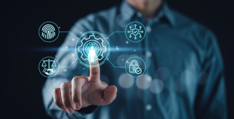 Human-centric AI and ethical artificial intelligence control concept. Business person touching digital interface icons of governance, data privacy, security, and fairness for AI responsibility