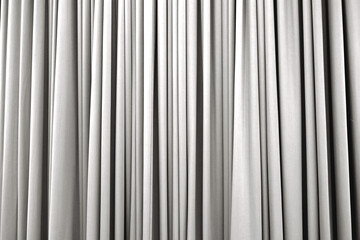 Obraz premium Snowy white curtain with many folds background texture