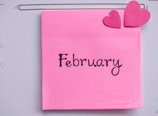 February - handwriting on a&nbsp;paper note