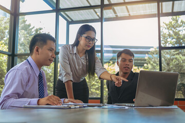 Business peoples meeting to discuss the situation on business plan, marketing for investment. Selected focus