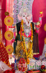 vibrant lord ganesha idol with traditional festive decorations on ganesh chaturthi