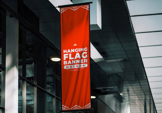Hanging Vertical Flag Banner Mockup on Building Exterior for Outdoor Signage and Street Branding