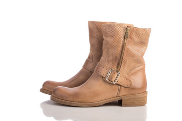 Brown leather ankle boots with zipper and buckled strap