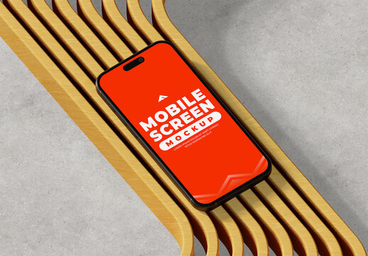 Smartphone Mockup on Striped Bench Featuring Graphic Patterns and Outdoor Visual Appeal