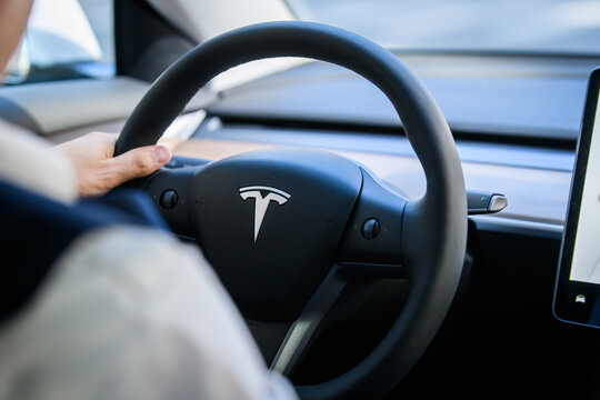 RIGA, LATVIA. 5th August 2022. Selective focus photo. TESLA vehicle steering wheel. TESLA is an American multinational automotive and clean energy company.